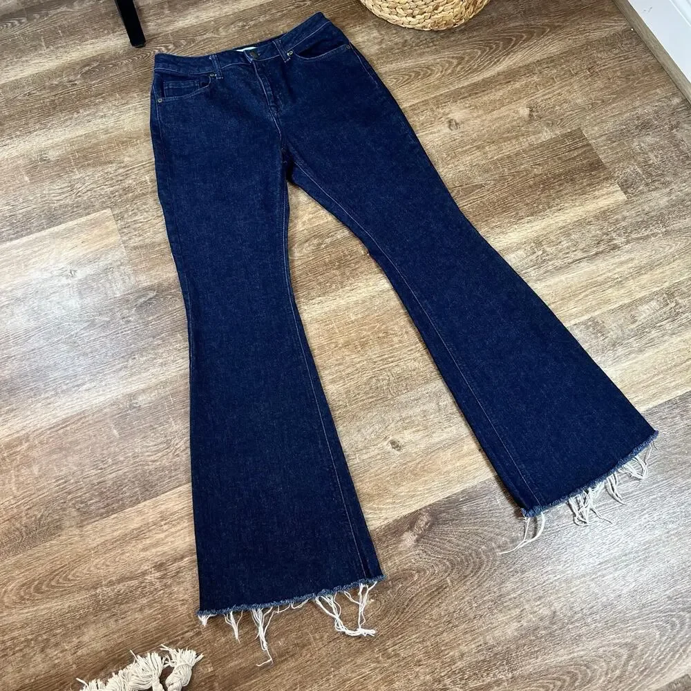 Antonio Melani NWOT dark wash flare raw hem jeans
